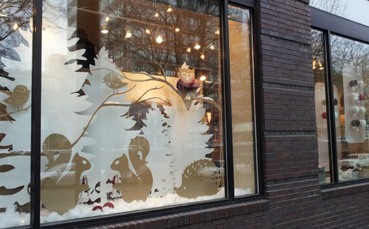 More animal figures in the second window followed by floating balls of yarn for a third, smaller window display.
